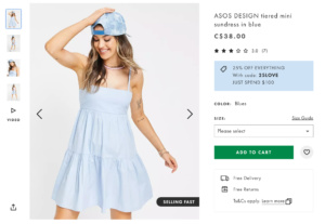 website display of a product page. Woman in a blue dress and blue backwards baseball cap
